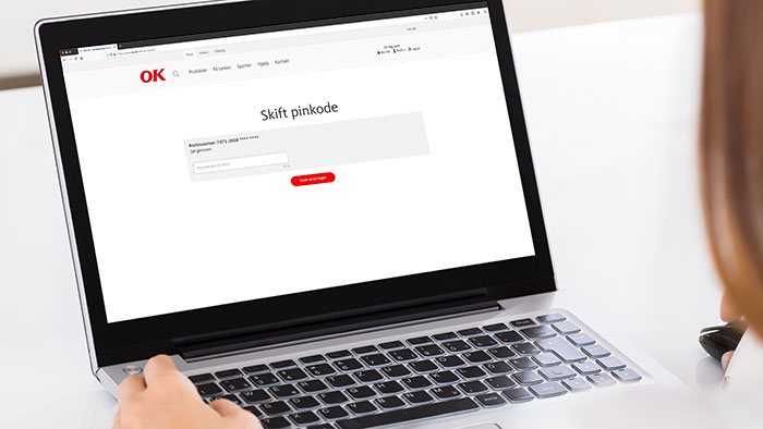 Bærbar computer med visning af hvor du selv kan skifte din pinkode på Min OK